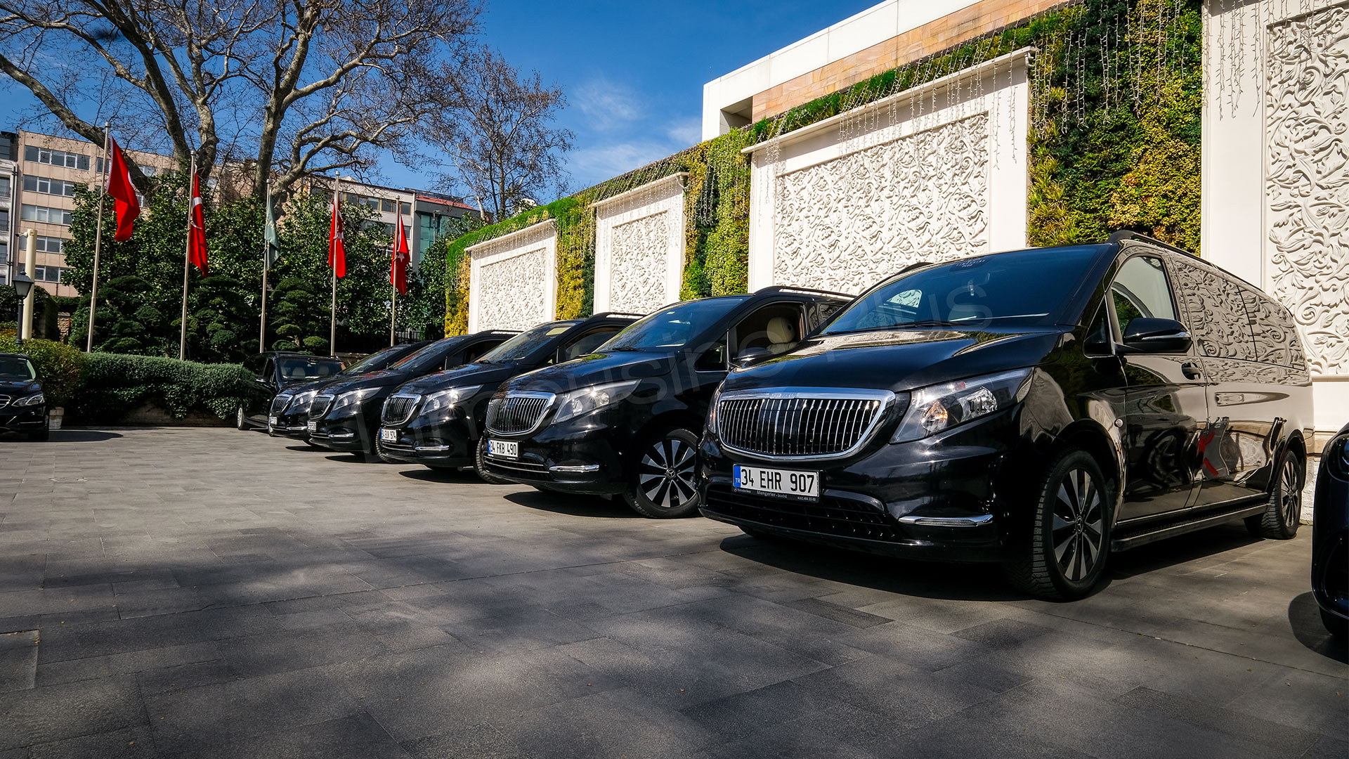Professional chauffeur providing VIP airport transfer service